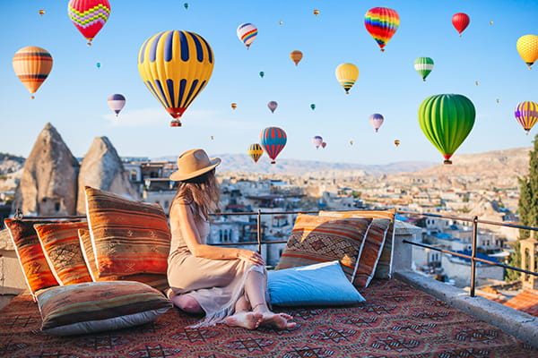 Cappadocia's iconic fairy chimneys and rock formations at sunrise